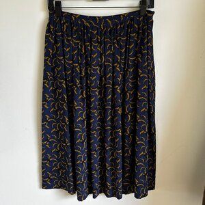 Laura Urbinati Pleated Midi Skirt – Navy & Mustard Print